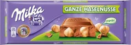 MILKA TÁBLÁS TEJCSOKOLÁDÉ 300G NUGÁT-EGÉSZMOGYORÓ (12)